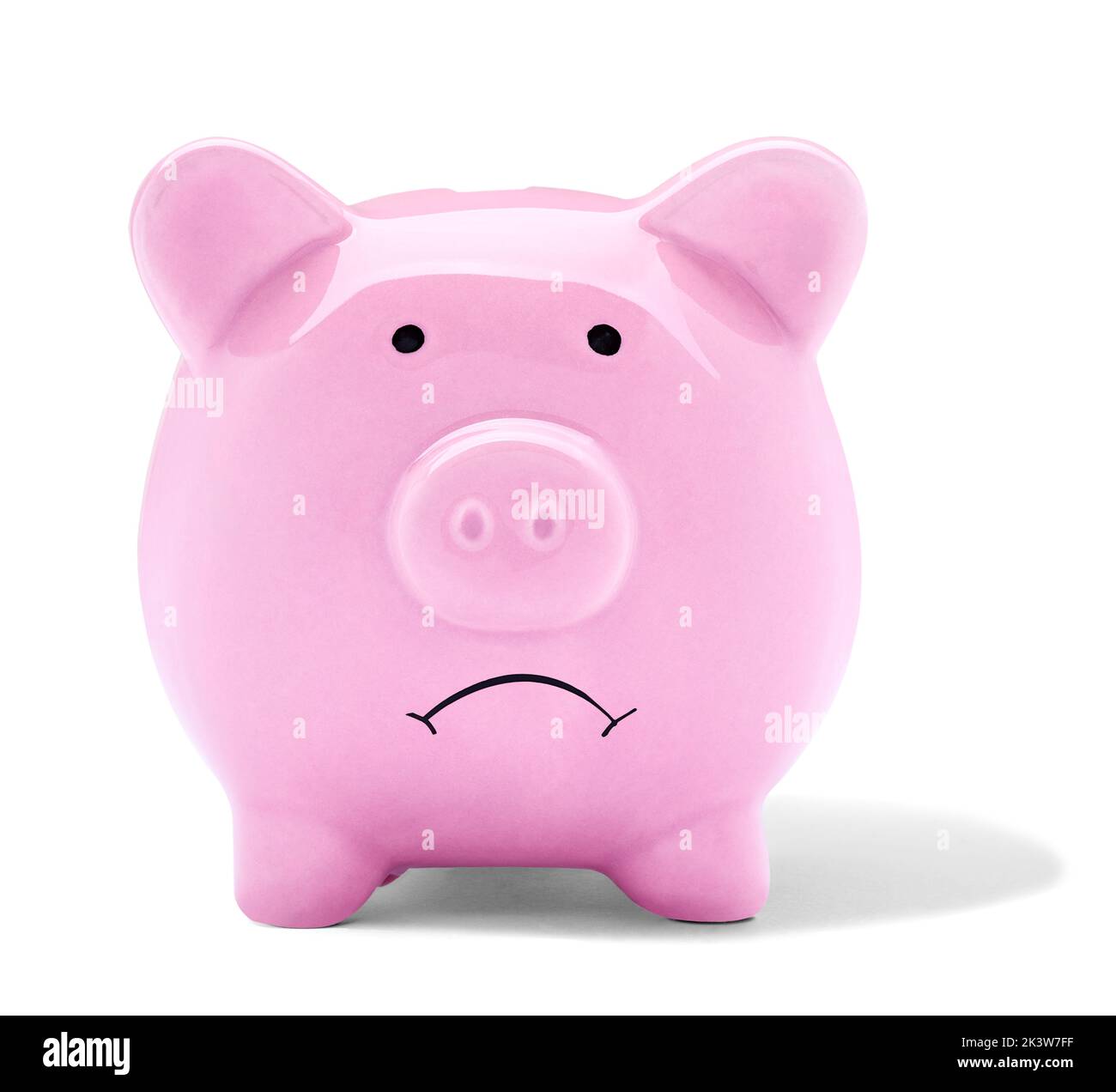 Close up of a sad pink piggy bank on white background Stock Photo