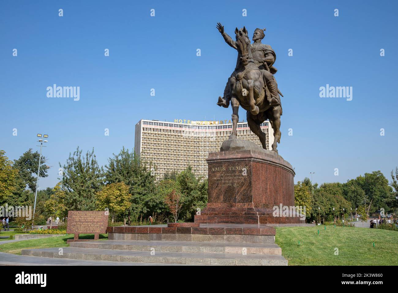 TASHKENT, UZBEKISTAN - SEPTEMBER 15, 2022: Monument to Amir Timur (Tamerlane) on the background of the Uzbekistan Hotel. Tashkent, Uzbekistan Stock Photo