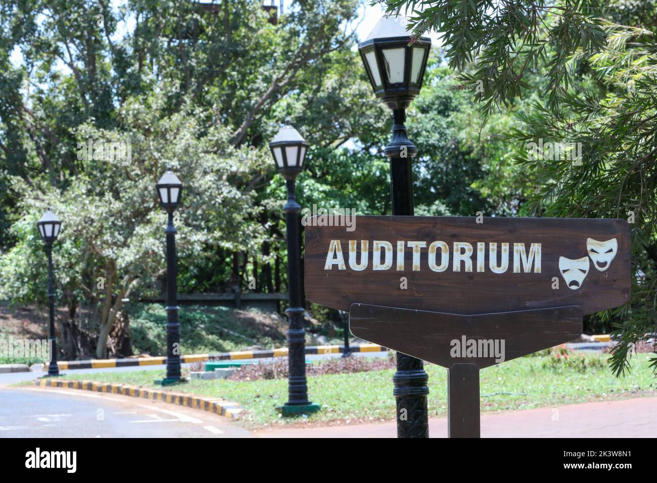 auditorium indication plate made of wood and stones Stock Photo