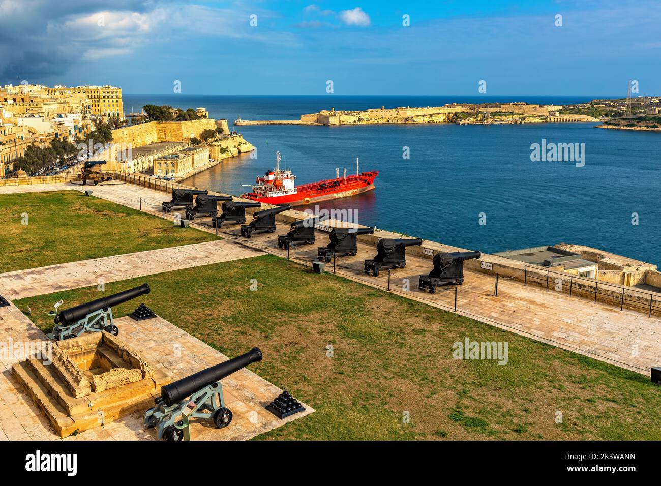 Old artillery battery on the bastion overlooking Grand Harbour in Valletta, Malta. Stock Photo