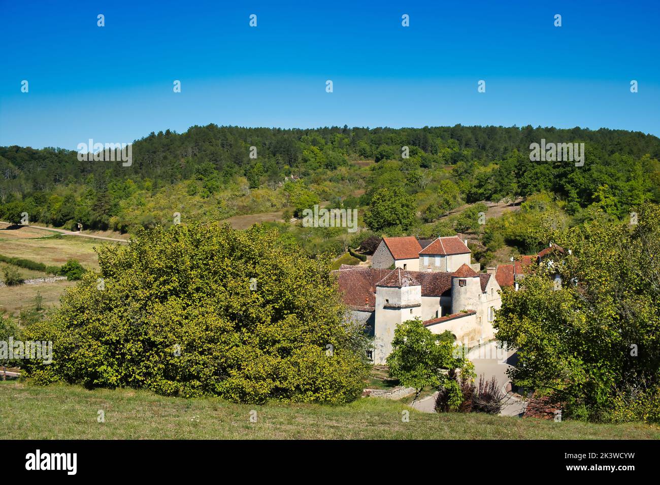 Part of the village of Asquins, department Yonne, in the hills of the Morvan, Burgundy, France, with a  fortified farmhouse typical of this area Stock Photo