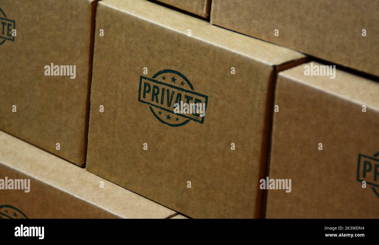 Private stamp printed on cardboard box. Privacy, secret and confidential concept. Stock Photo