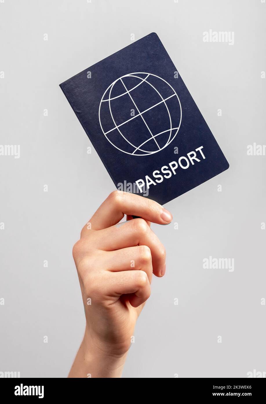 Hand holding abstract passport, ID document close up. Photo Stock Photo