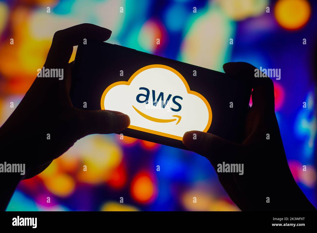 In this photo illustration, the Amazon Web Services (AWS) logo is seen displayed on a smartphone. Stock Photo