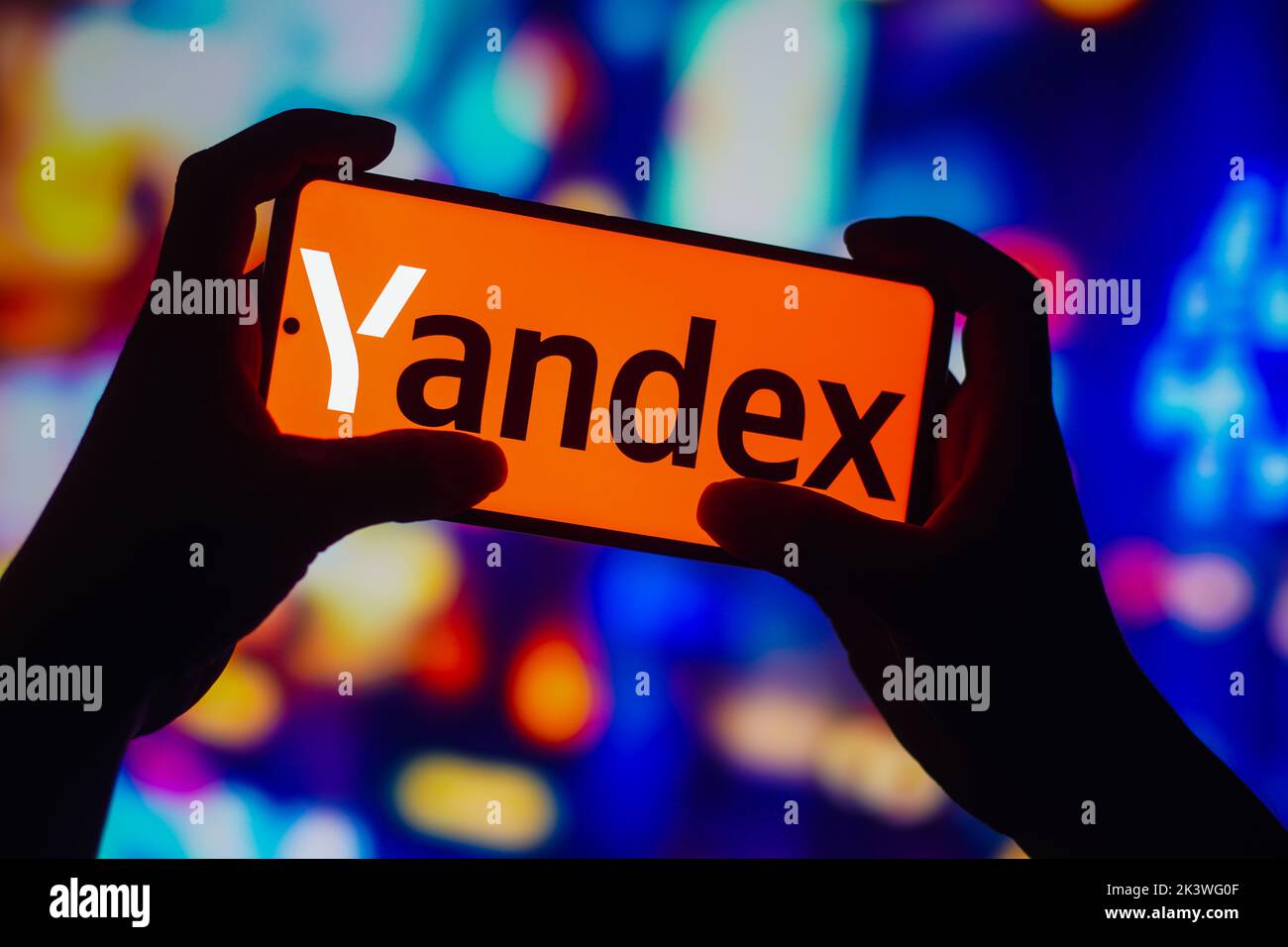In this photo illustration, the Yandex logo is seen displayed on a smartphone. Stock Photo