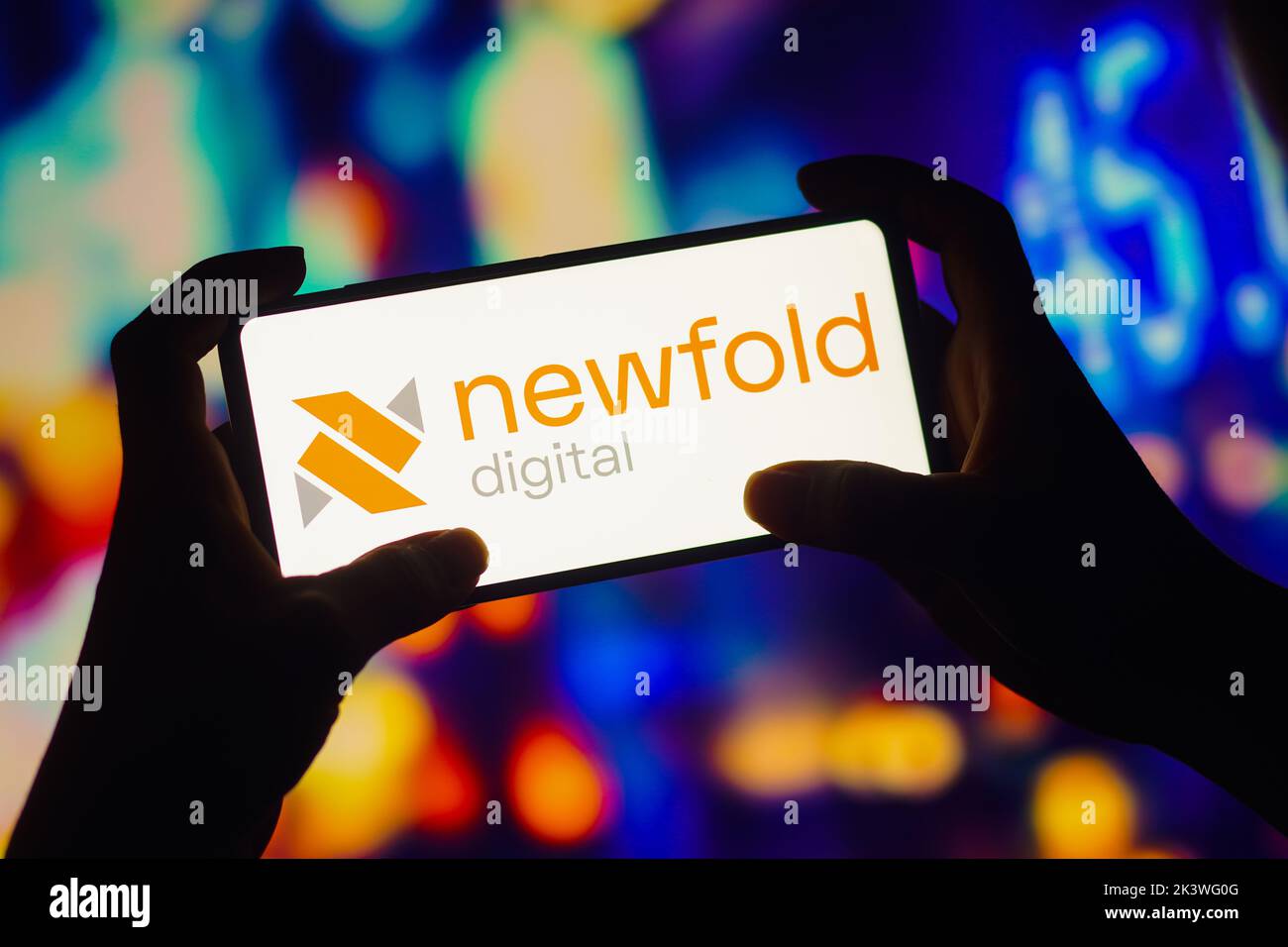 In this photo illustration, the Newfold Digital logo is seen displayed on a smartphone. Stock Photo