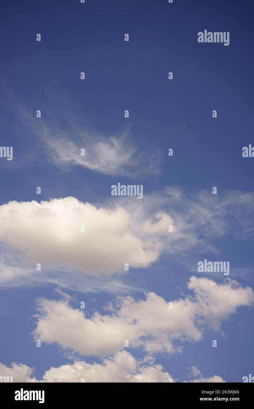 Summer background blue sky with white fluffy clouds Stock Photo - Alamy