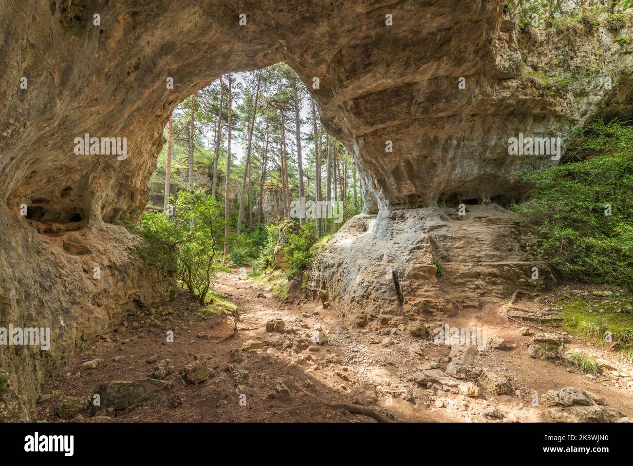 Stone arches on the path of the arcs of st pierre on the causse mejean in the cevennes. Lozere, France. Stock Photo