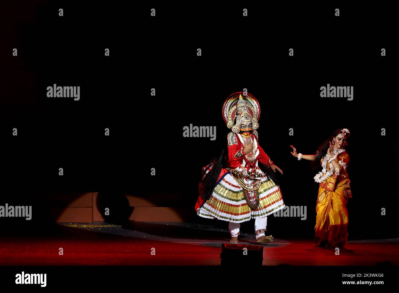 Artists perform in the roles of Sita (R), the wife of Hindu god Rama, and his rival Ravana (L), ?in the 'Ramlila,' a 10-day enactment of the life of Hindu deity Rama which culminates in the festival of Dussehra, organised by Shriram Bharatiya Kala Kendra. The 10 days are also known as the Vijayadashami celebration, at the end of Navratri every year. The day marks Lord Ram's defeat over the evil king of the demons, Ravana. Stock Photo