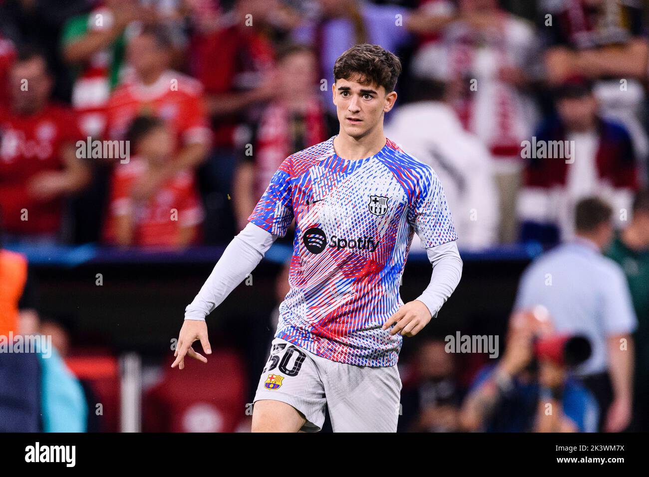 MUNICH, GERMANY - SEPTEMBER 13: Pablo Gavi of Barcelona warming up during  the UEFA Champions League group C match between FC Bayern München and FC  Barcelona at Allianz Arena on September 13,