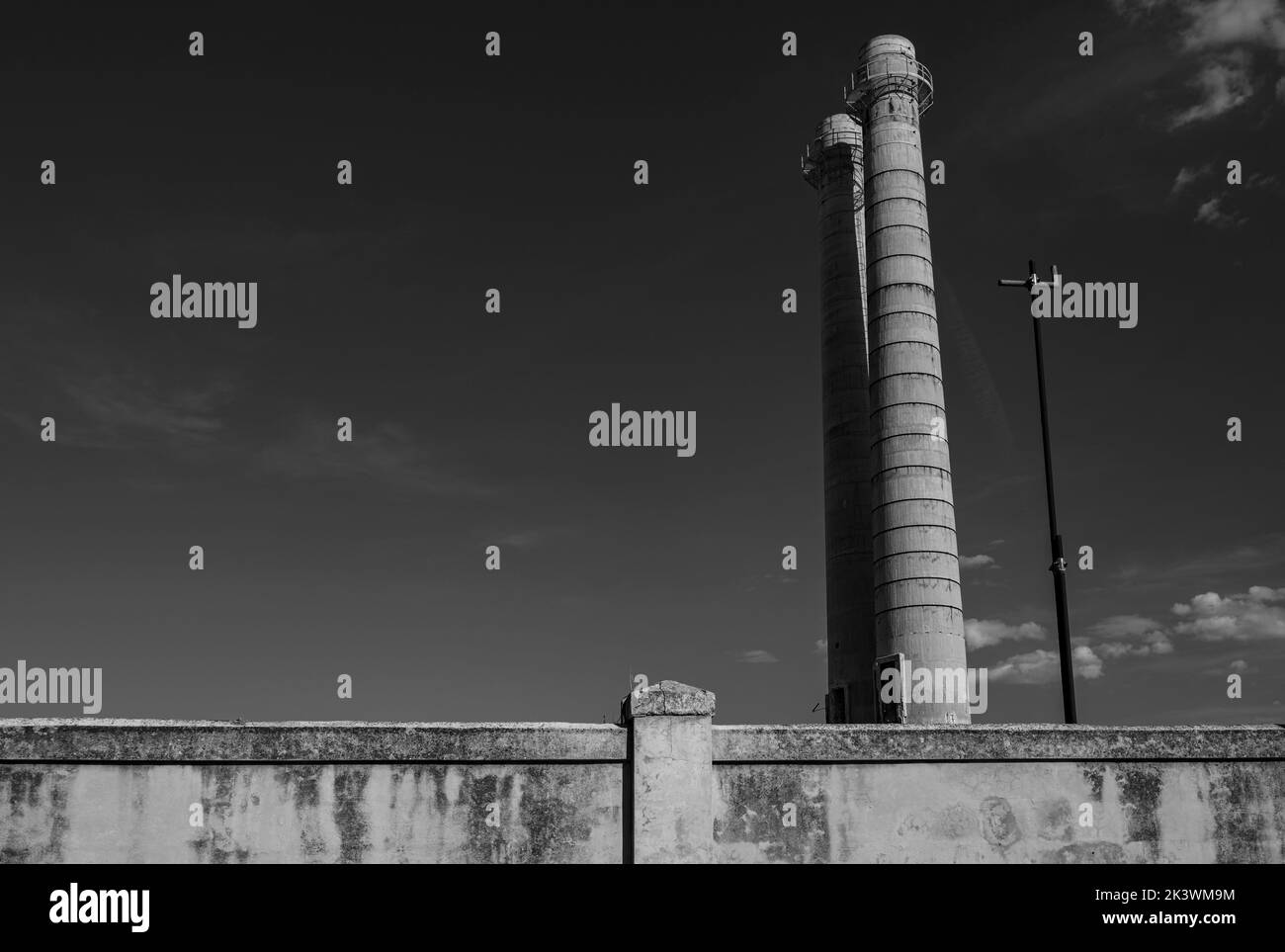 Chimneys remains Cement WorKs, now demolished, in Monopoli, Italy Stock Photo