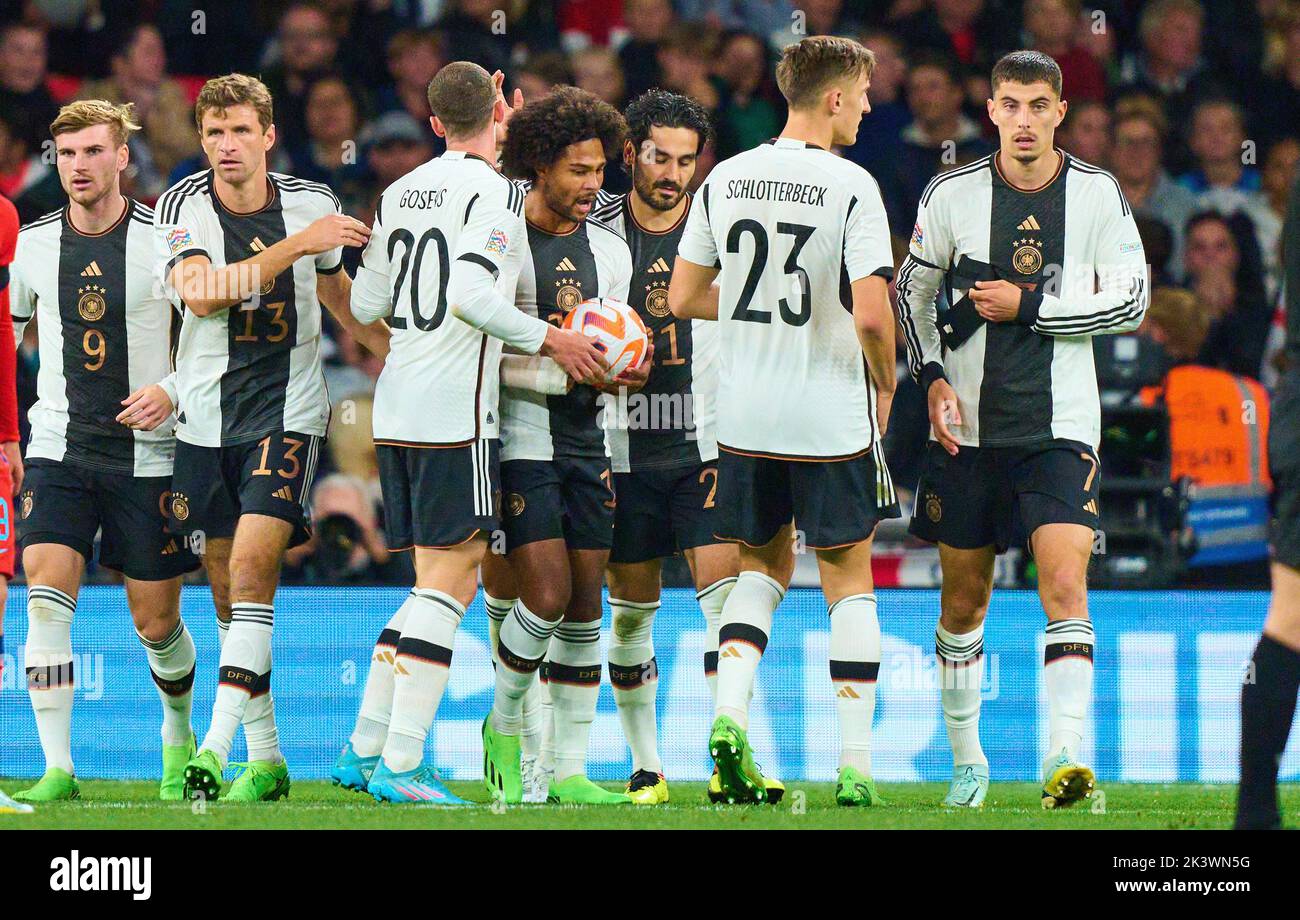 Kai Havertz, DFB 7 celebrates his goal, happy, laugh, celebration, 3-3 with David Raum, DFB 3  Ilkay Gündogan, DFB 21 Timo Werner, DFB 9 Thilo Kehrer, DFB 5 Nico Schlotterbeck, DFB 23 Thomas Müller, DFB 13 Serge Gnabry, DFB 10  in the UEFA Nations League 2022 match  ENGLAND - GERMANY 3-3  in Season 2022/2023 on Sept 26, 2022  in London, Great Britain.  © Peter Schatz / Alamy Live News Stock Photo
