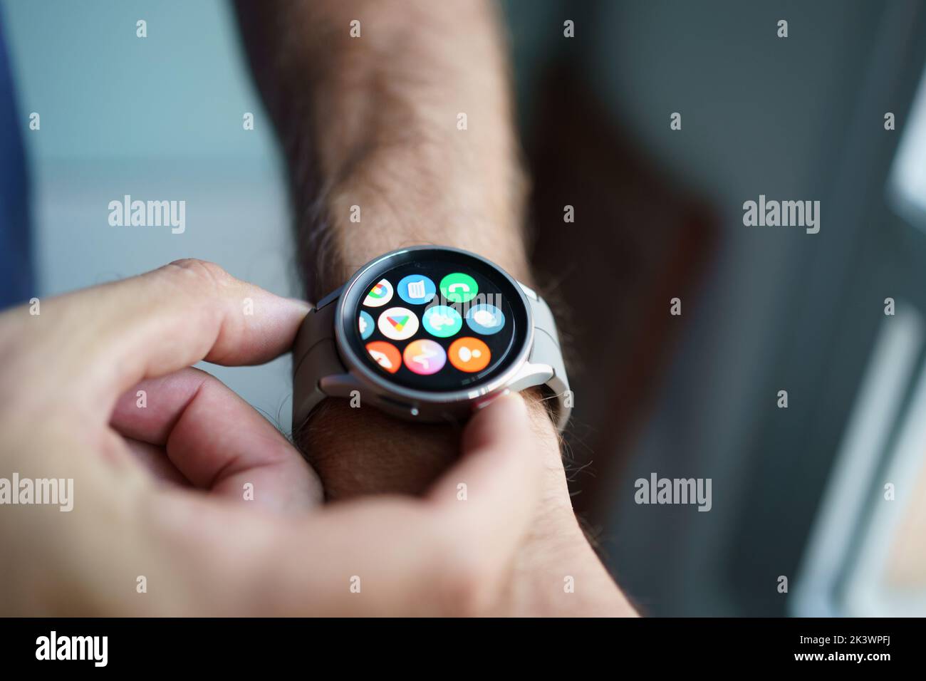 Granada, Andalusia, Spain - September 28, 2022: Man using the app screen of the new Samsung Watch 5 Pro. Stock Photo