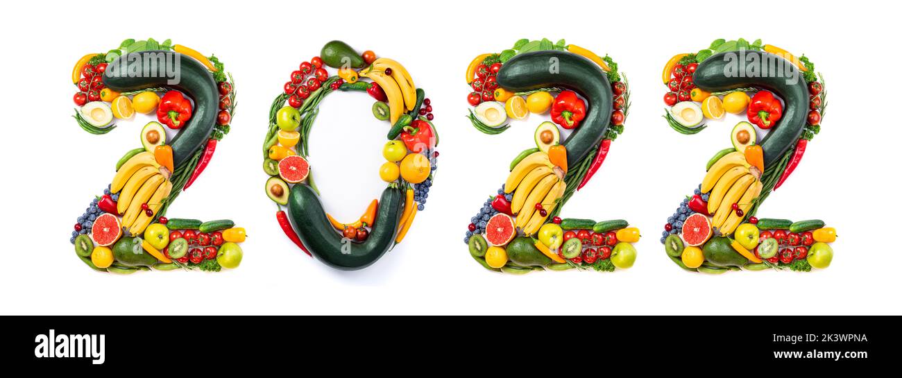 New Year 2022 made of vegetables and fruits on white background. Number