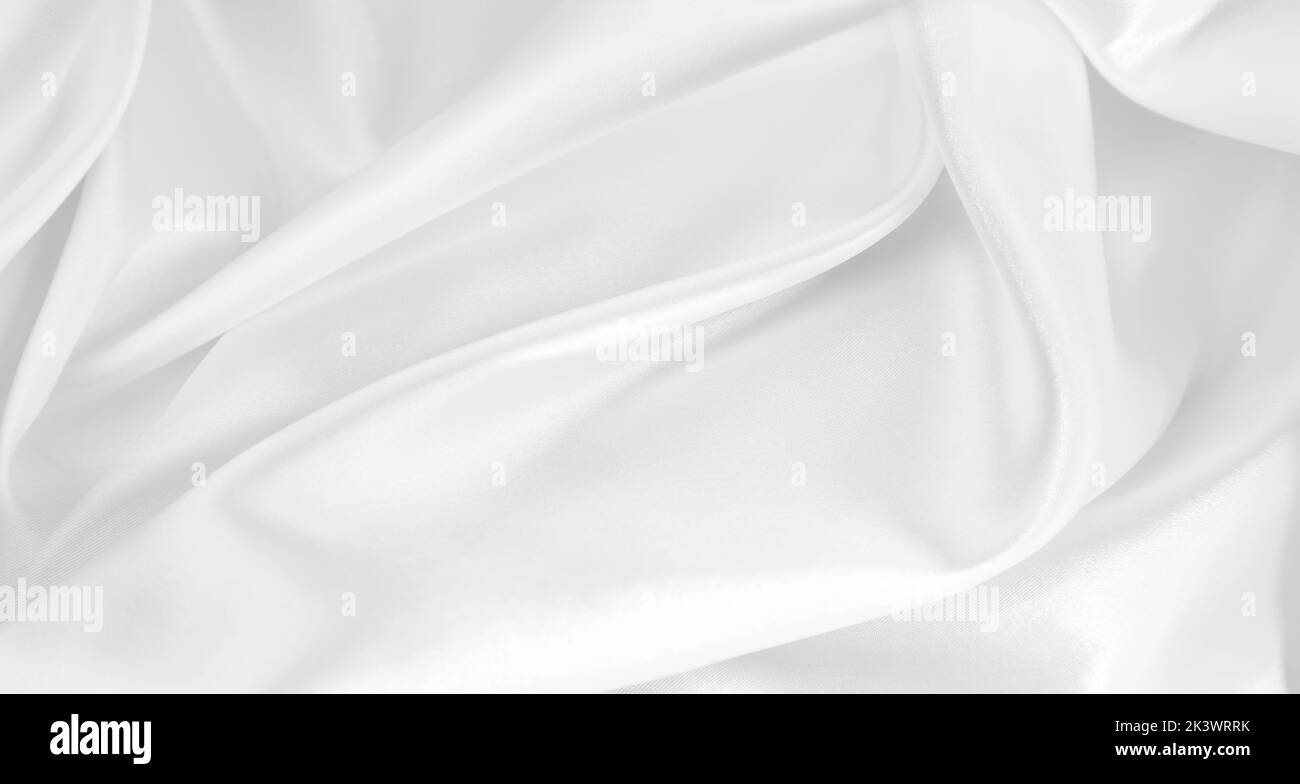 Rippled white silk fabric texture background Stock Photo