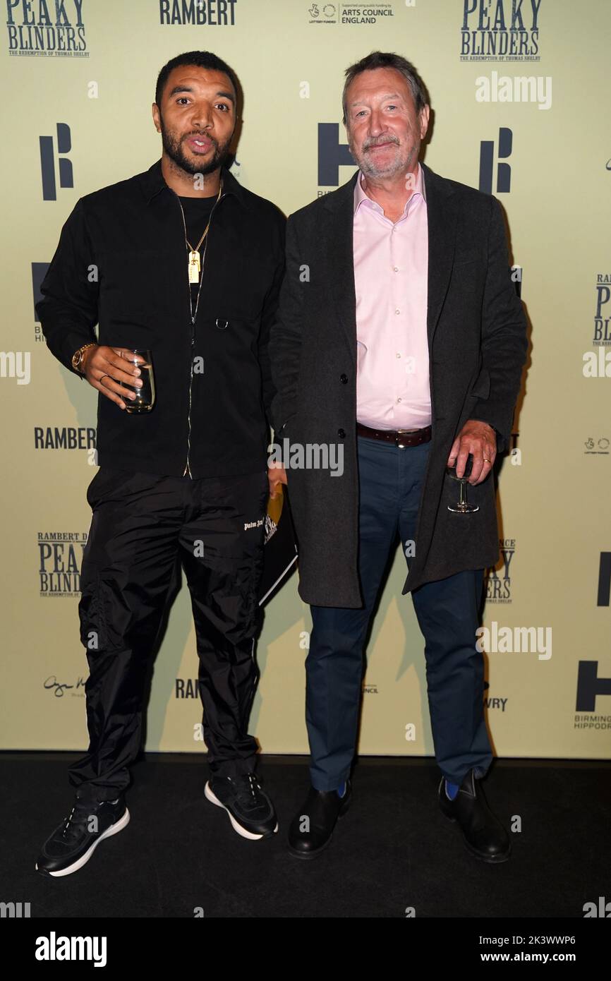 Troy Deeney (left) and Steven Knight attending the opening night of Rambert's Peaky Blinders: The Redemption of Thomas Shelby, at the Birmingham Hippodrome. Picture date: Tuesday September 27, 2022. Stock Photo