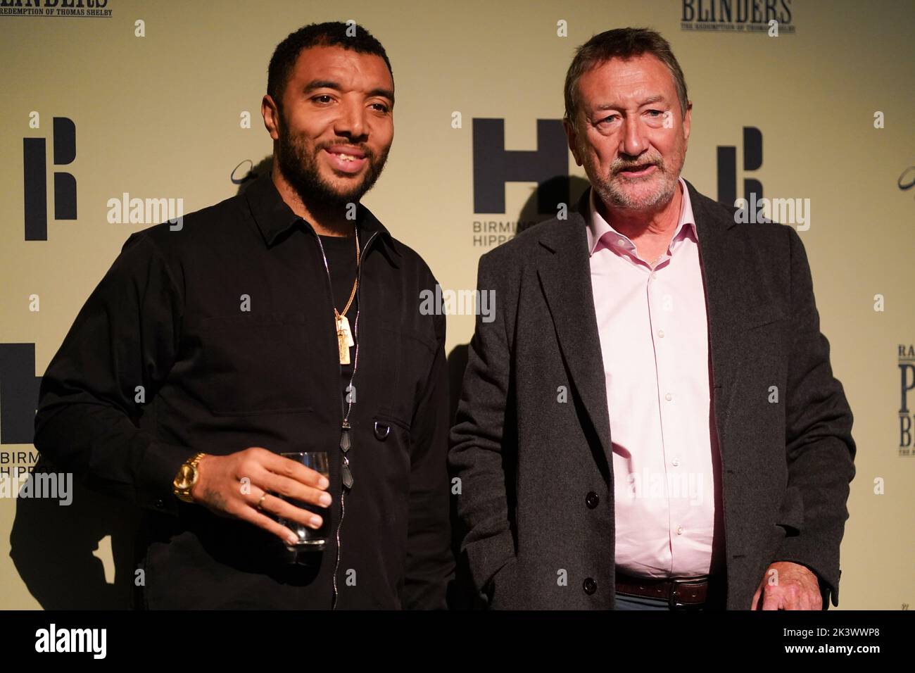 Troy Deeney (left) and Steven Knight attending the opening night of Rambert's Peaky Blinders: The Redemption of Thomas Shelby, at the Birmingham Hippodrome. Picture date: Tuesday September 27, 2022. Stock Photo