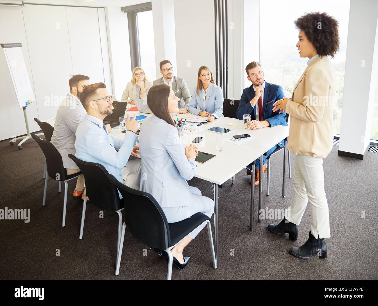 young business people meeting office teamwork group success corporate discussion Stock Photo