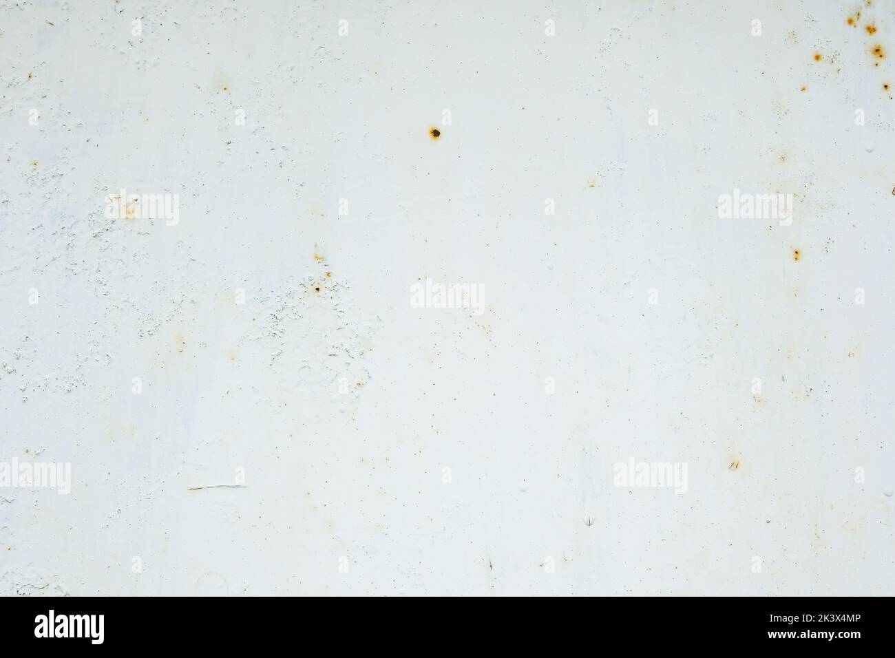 Corrosion of metal. Rust shows through the white paint. Rusty texture ...