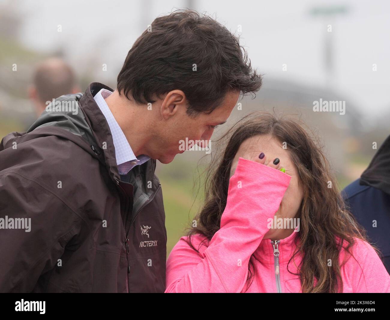 Prime Minister Justin Trudeau comforts resident Amy Osmond during his ...