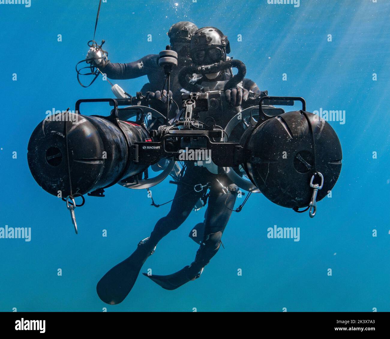 , United States of America. 24 September, 2022. U.S. Navy SEALs assigned to Naval Special Warfare command operate a Diver Propulsion Device during high-altitude dive training at a mountain lake, September 24, 2022 in Northern California.  Credit: MC2 Alex Perlman/US Navy Photo/Alamy Live News Stock Photo