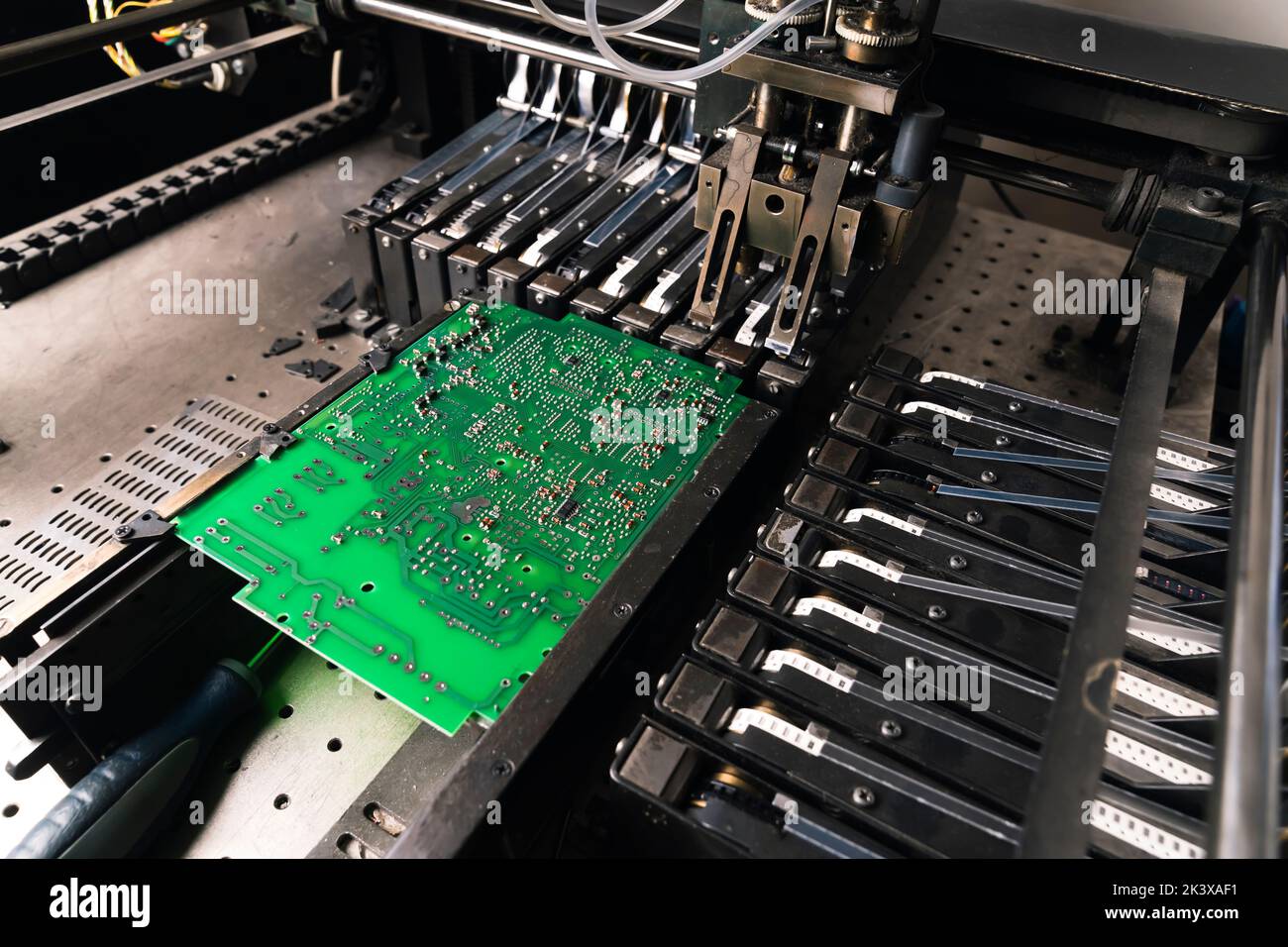 Close up of SFD surface-mount device working on PCB printed circuit board. Assembling. Modern technology. High quality photo Stock Photo