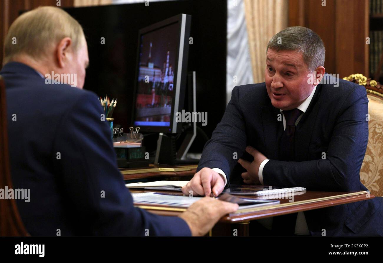 Moscow, Russia. 28th Sep, 2022. Russian President Vladimir Putin holds a face-to-face meeting with the Governor of the Volgograd Region Andrei Bocharov, right, at the Kremlin, September 28, 2022 in Moscow, Russia. Credit: Gavriil Grigorov/Kremlin Pool/Alamy Live News Stock Photo