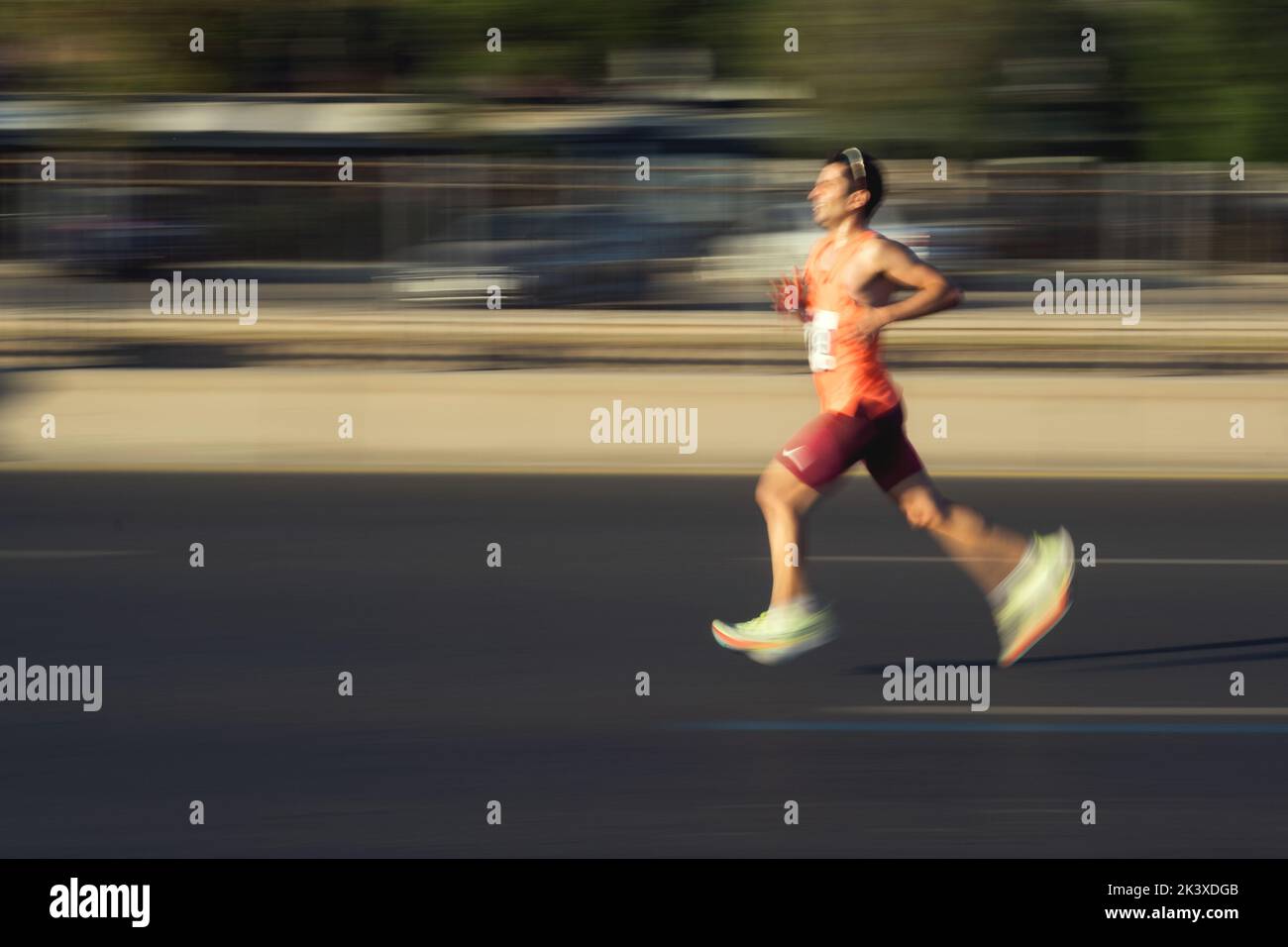 Izmir, Turkey - September 11, 2022: Running man with motion blur in the half marathon are running special for the 100th anniversary of Izmir's liberat Stock Photo