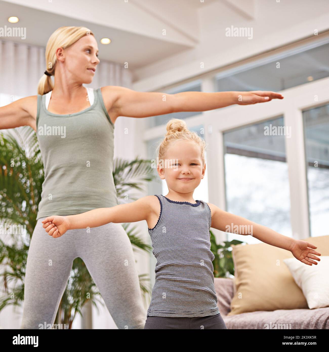 Yoga has no age restriction. Full length shot of a mother and daughter doing yoga together. Stock Photo