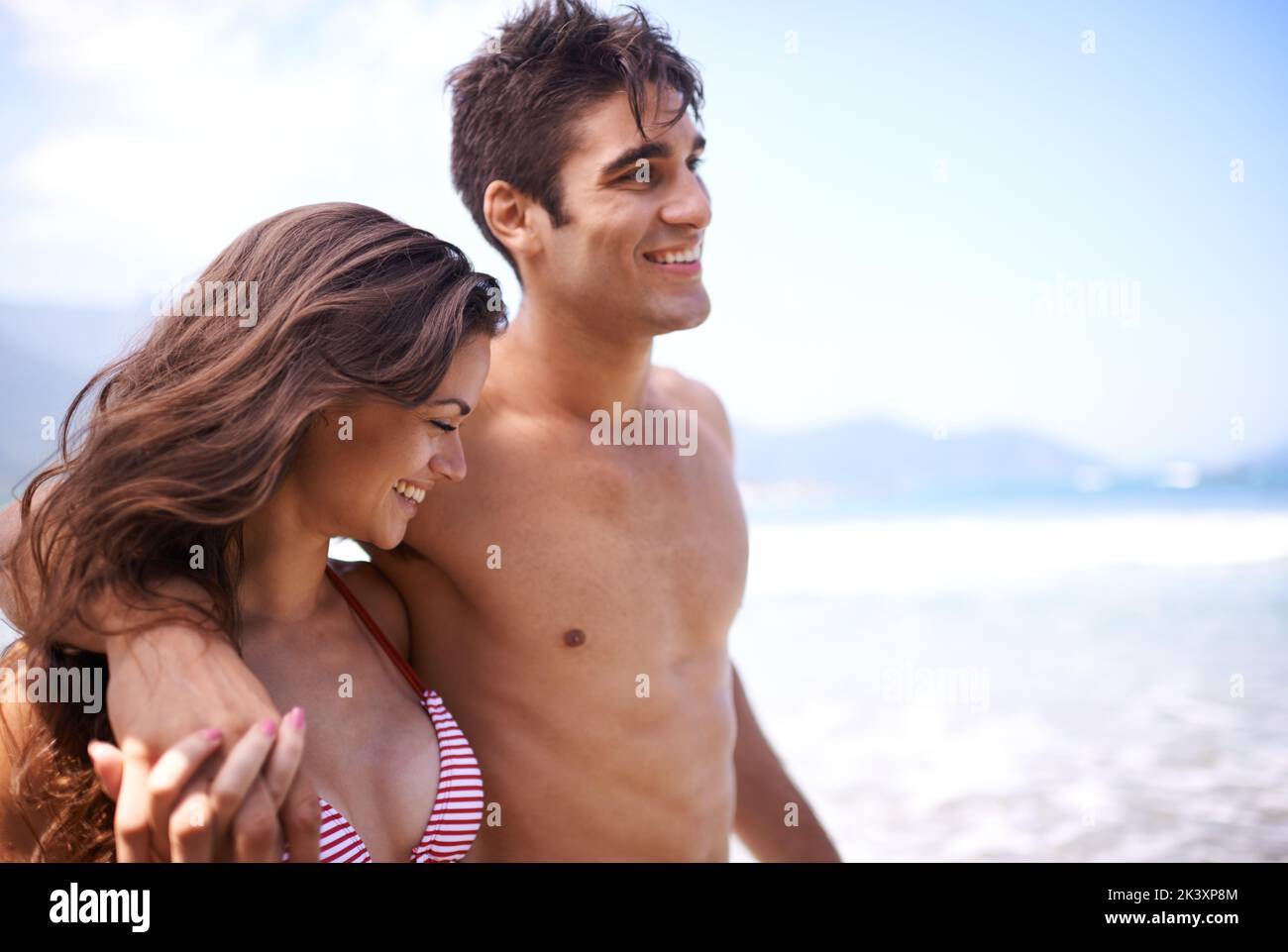 Its romance in paradise. a young couple enjoying a beach getaway. Stock Photo
