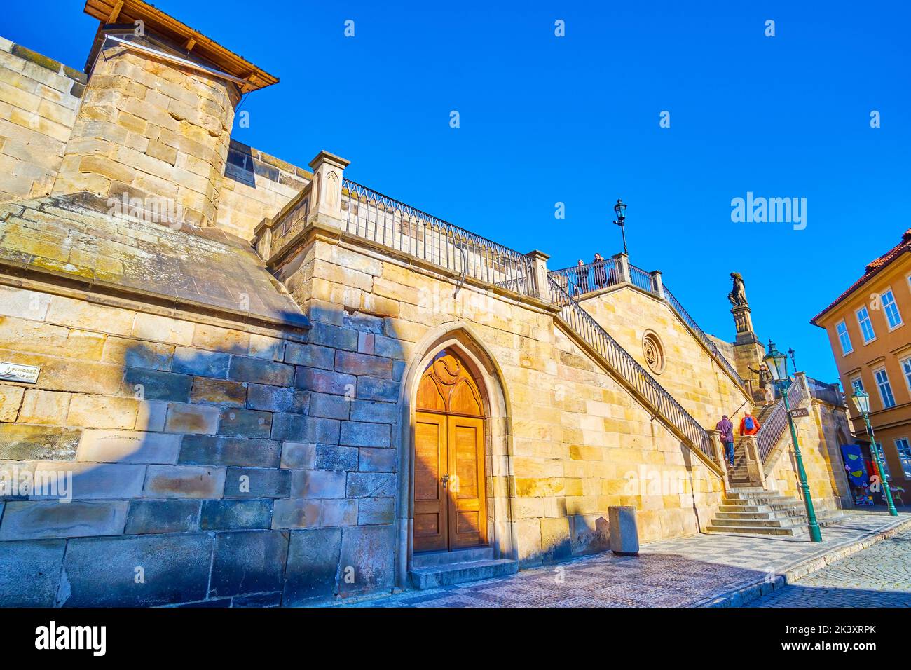 PRAGUE, CZECH REPUBLIC - MARCH 12, 2022: The historic stone staircases of Charles Bridge to Kampa island in Mala Strana district, on March 12 in Pragu Stock Photo