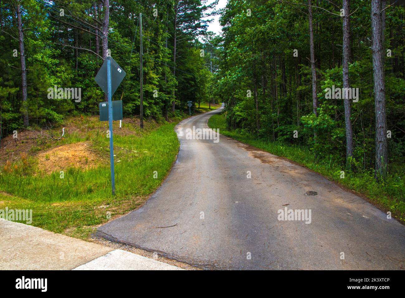 Ga Path. Sign Silver Comet Trail 65 mile paved path Georgia USA curvy road street ...