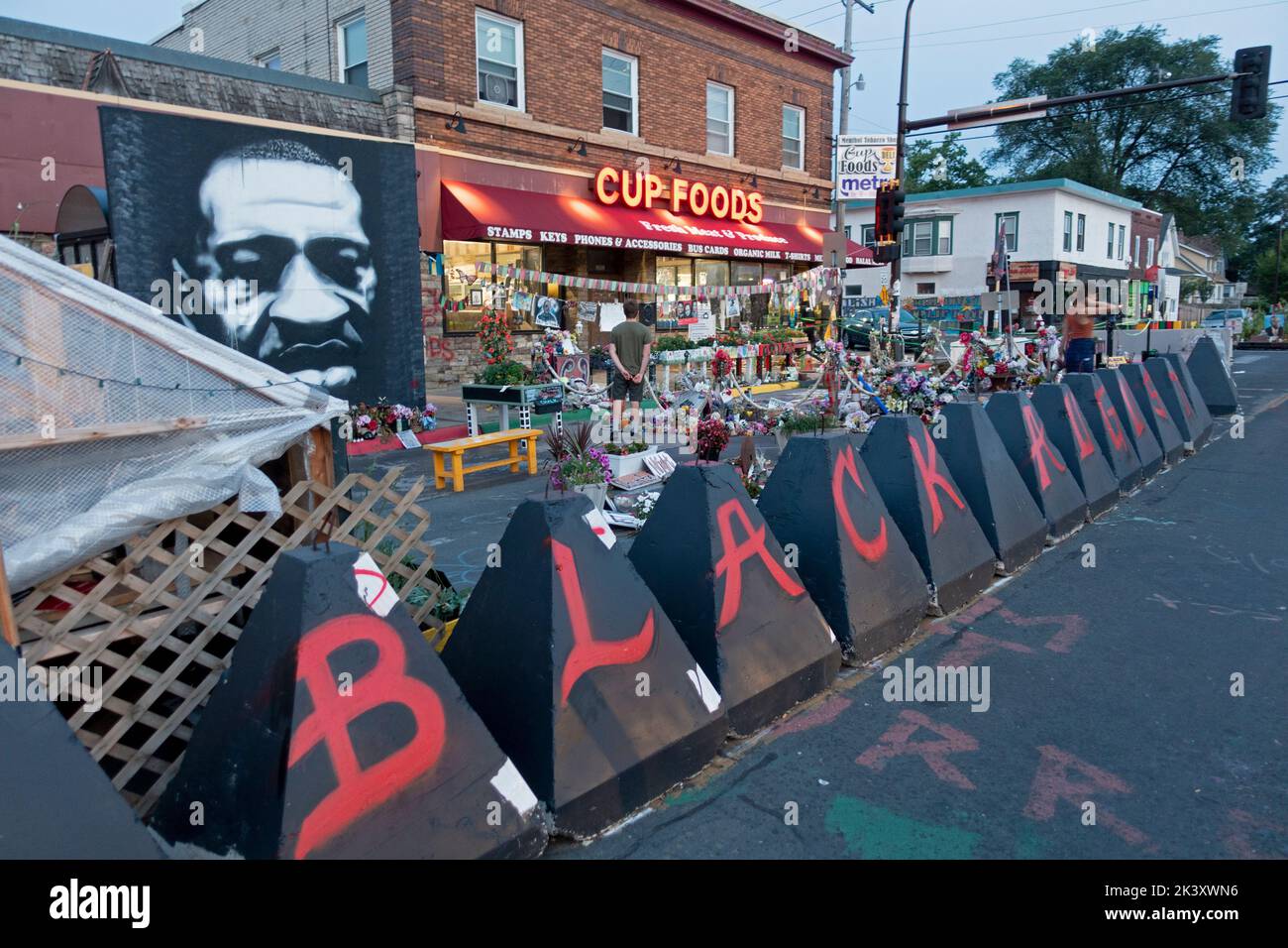 Chicago and 36th George Floyd Memorial and Cup Foods a sacred place with flowers and art large portrait of George Floyd. Minneapolis Minnesota MN USA Stock Photo