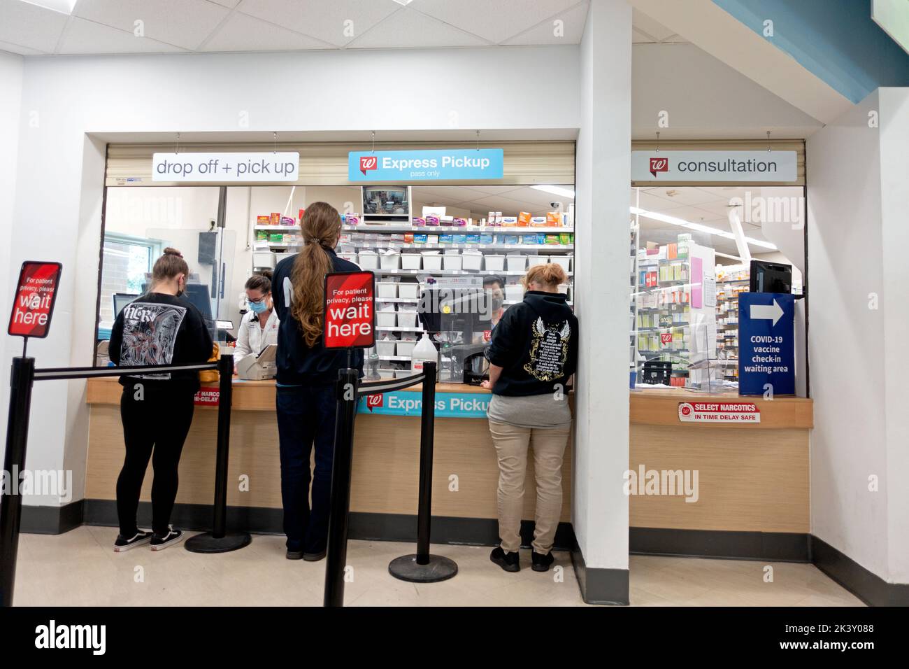 Customers being served at the Walgreens Pharmacy counter. St Paul Minnesota MN USA Stock Photo