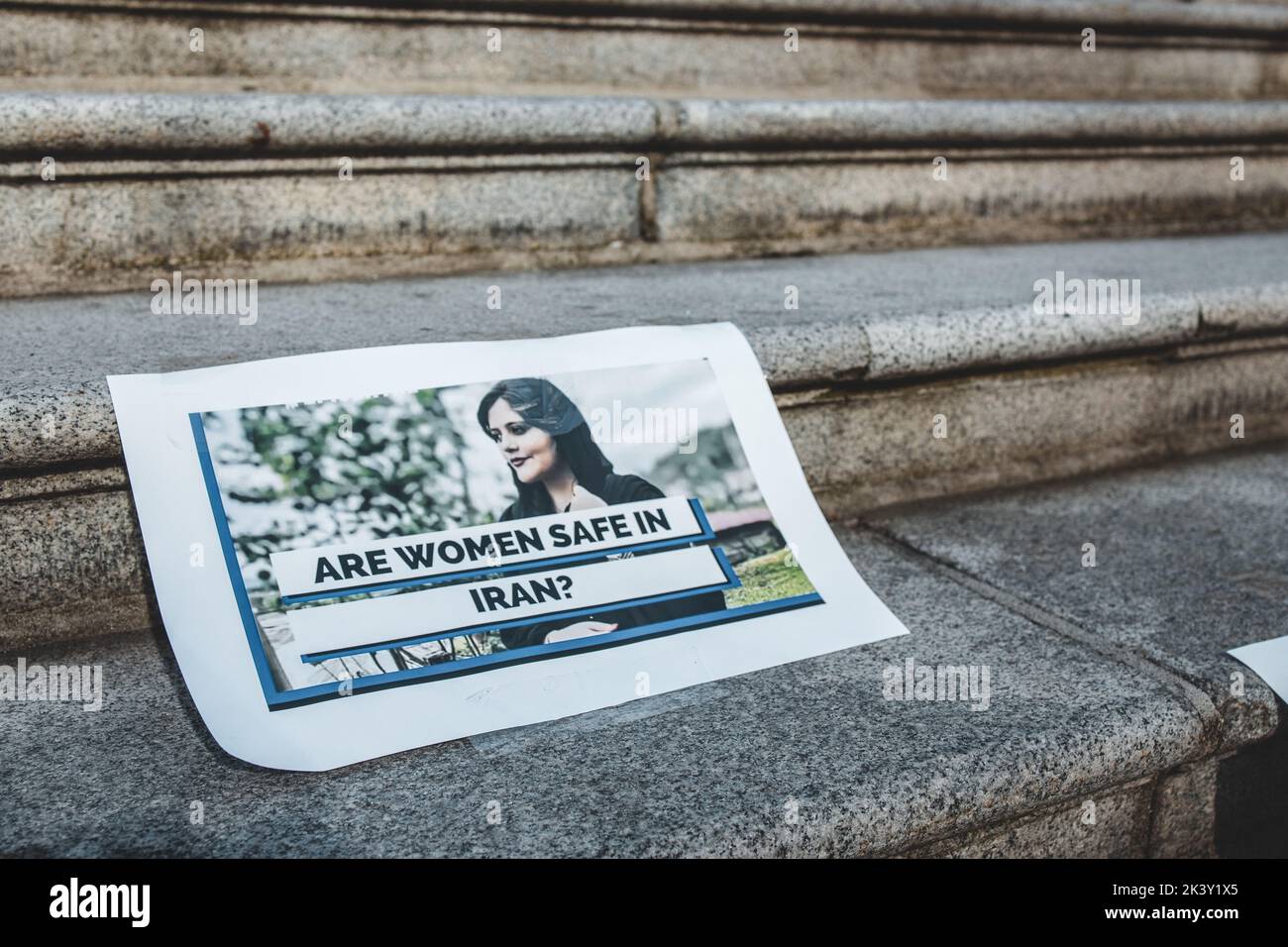 Vancouver, Canada - September 25,2022: Huge rally in support of Iranian protests in front of Vancouver Art Gallery. View of sign Are women safe in Ira Stock Photo