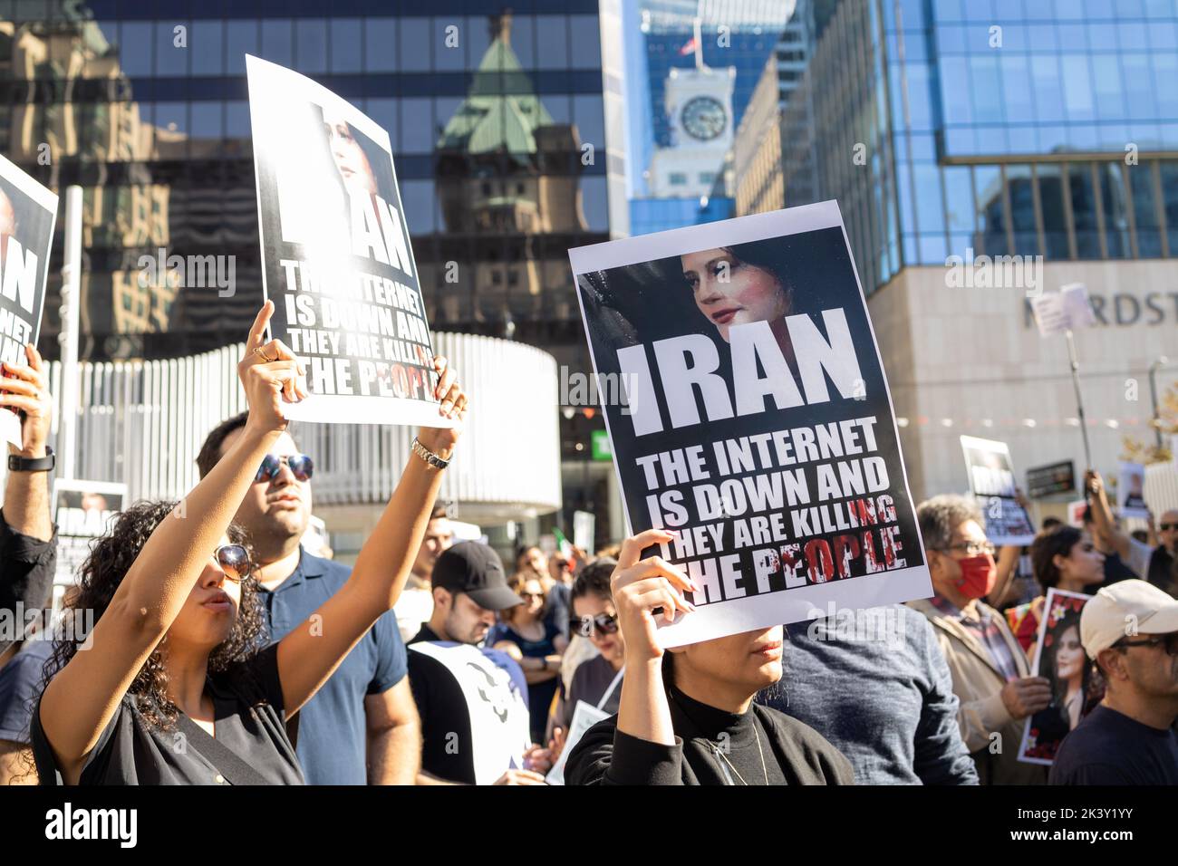 Vancouver, Canada - September 25,2022: Huge rally in support of Iranian protests in front of Vancouver Art Gallery. Woman with a sign The internet is Stock Photo