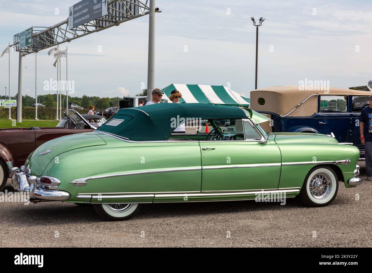 A green 1952 Hudson Hornet Convertible Brougham lines prior to being offered for sale at the Worldwide Auctioneers 2022 Auburn Auction in Auburn, Ind. Stock Photo