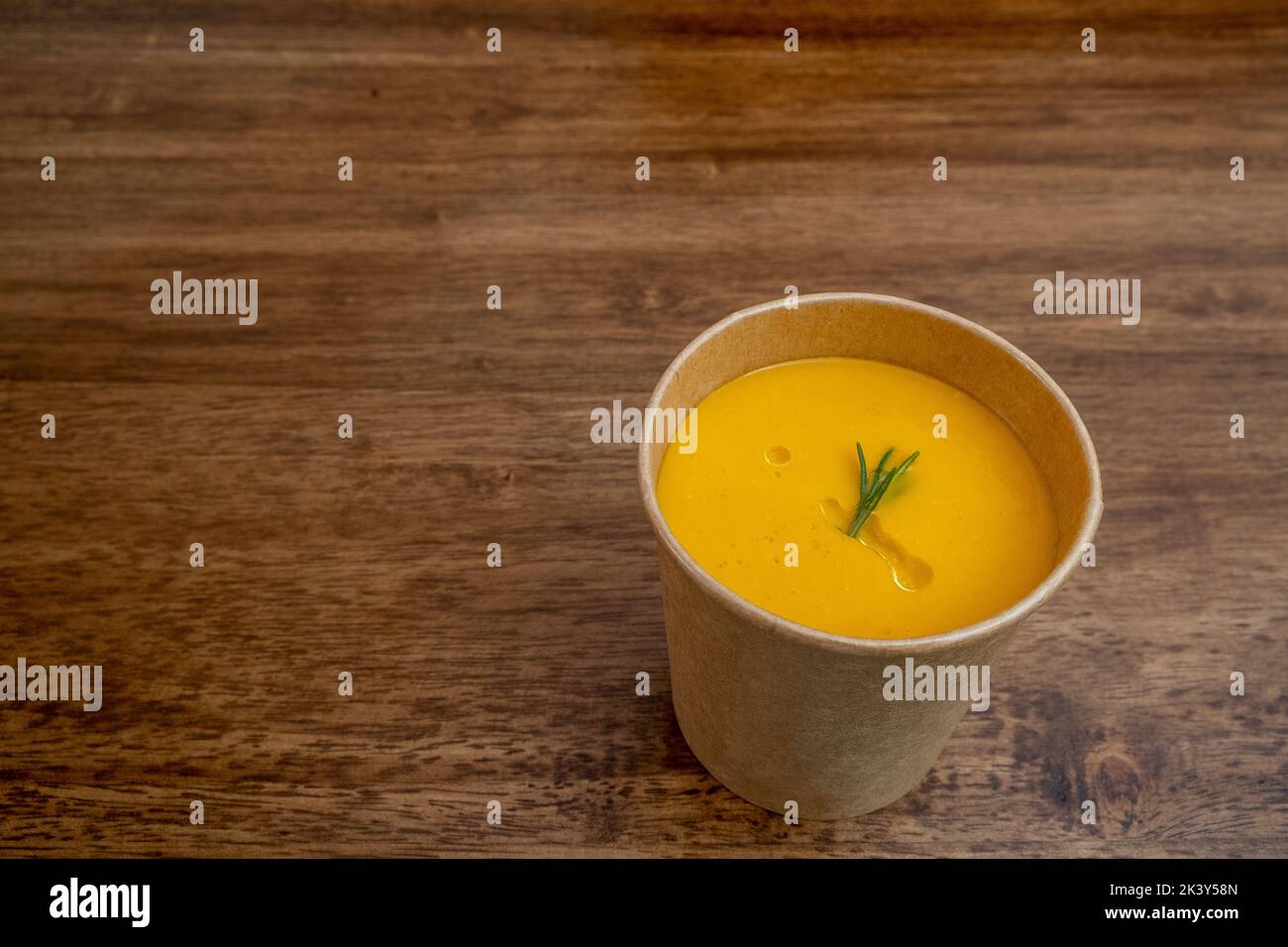tomato soup on the wooden table top Stock Photo