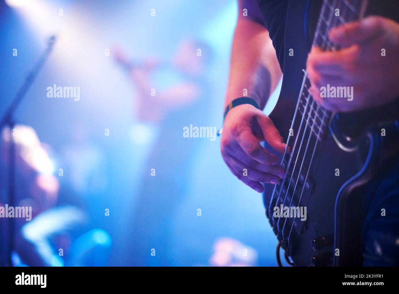 Rocking out. Cropped image of a young guitarist playing on stage Stock ...