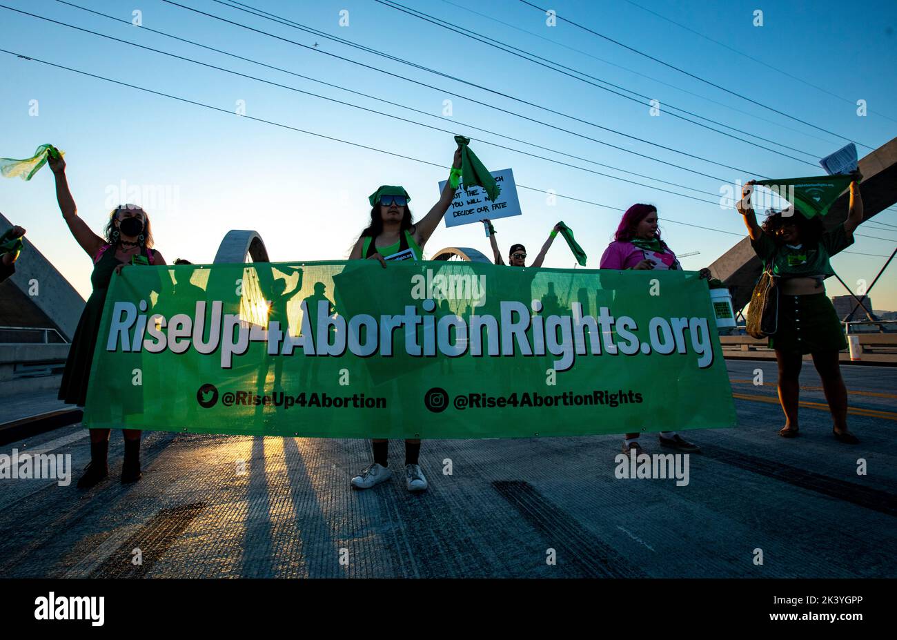 Los Angeles, California, USA. 28th Sep, 2022. Abortion Rights protesters carry a banner across the 6th Street Bridge at a protest with the group Rise Up 4 Abortion Rights in Downtown Los Angeles on ''International Safe Abortion'' day. (Credit Image: © Jill Connelly/ZUMA Press Wire) Stock Photo