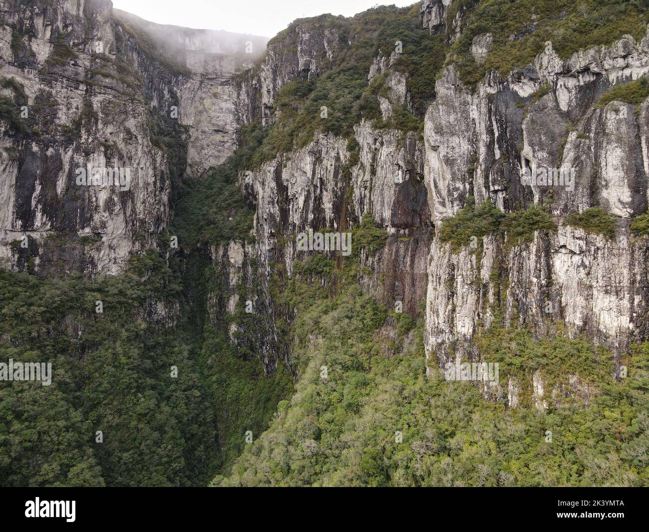 An aerial view of the scenic mountainous landscape on a misty day Stock ...