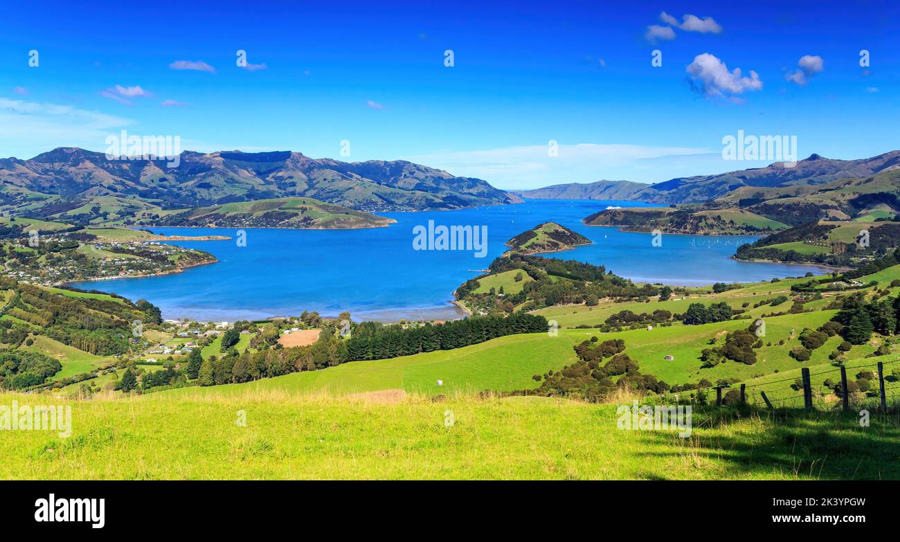 A panoramic view of Akaroa Harbour on Banks Peninsula, New Zealand. The
