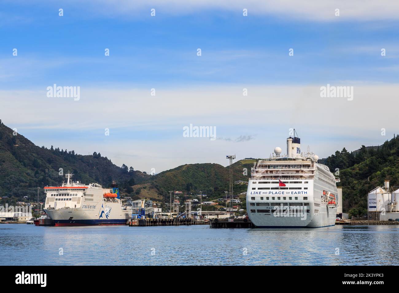 The port of Picton, New Zealand. The Interislander ferry 'Kaitaki' and the P&O cruise ship 'Pacific Jewel' are docked at the wharves Stock Photo