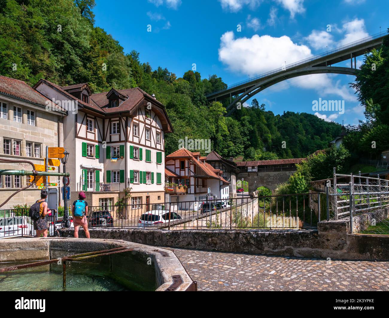 Fribourg, Switzerland - August 31, 2022: A modern highway viaduct over a historic old town of Fribourg, Switzerland Stock Photo