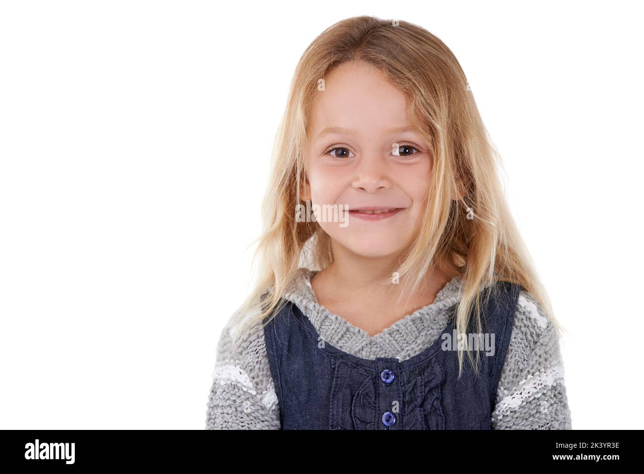 This little girl does things her own way. Portrait of an adorable little girl. Stock Photo