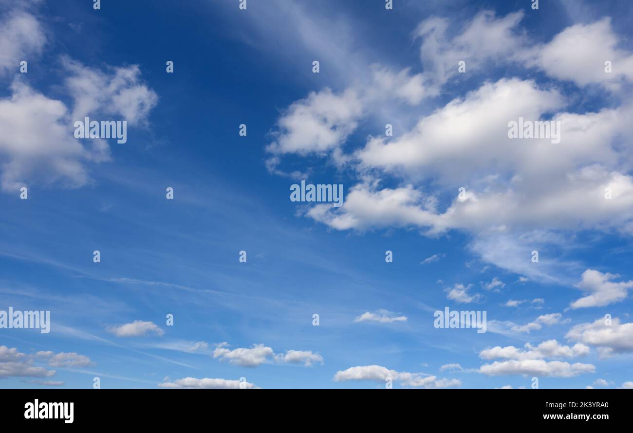 Panorama of blue sky and white clouds over horizon.. Stock Photo
