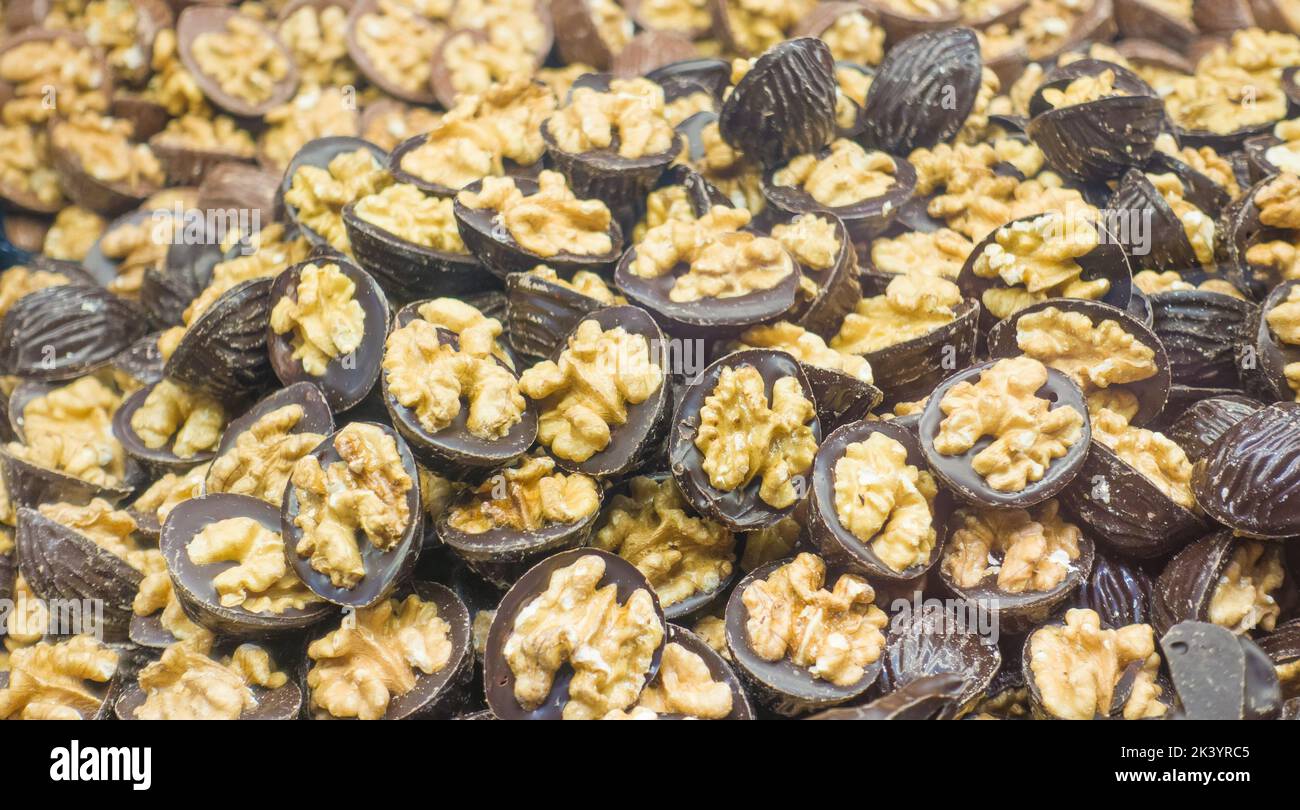 Photo of walnut in chocolate.. Stock Photo