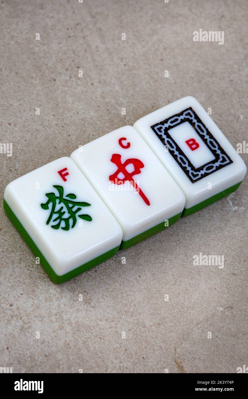 Classic mahjong board game tiles and play, ancient Chinese favorite Stock Photo