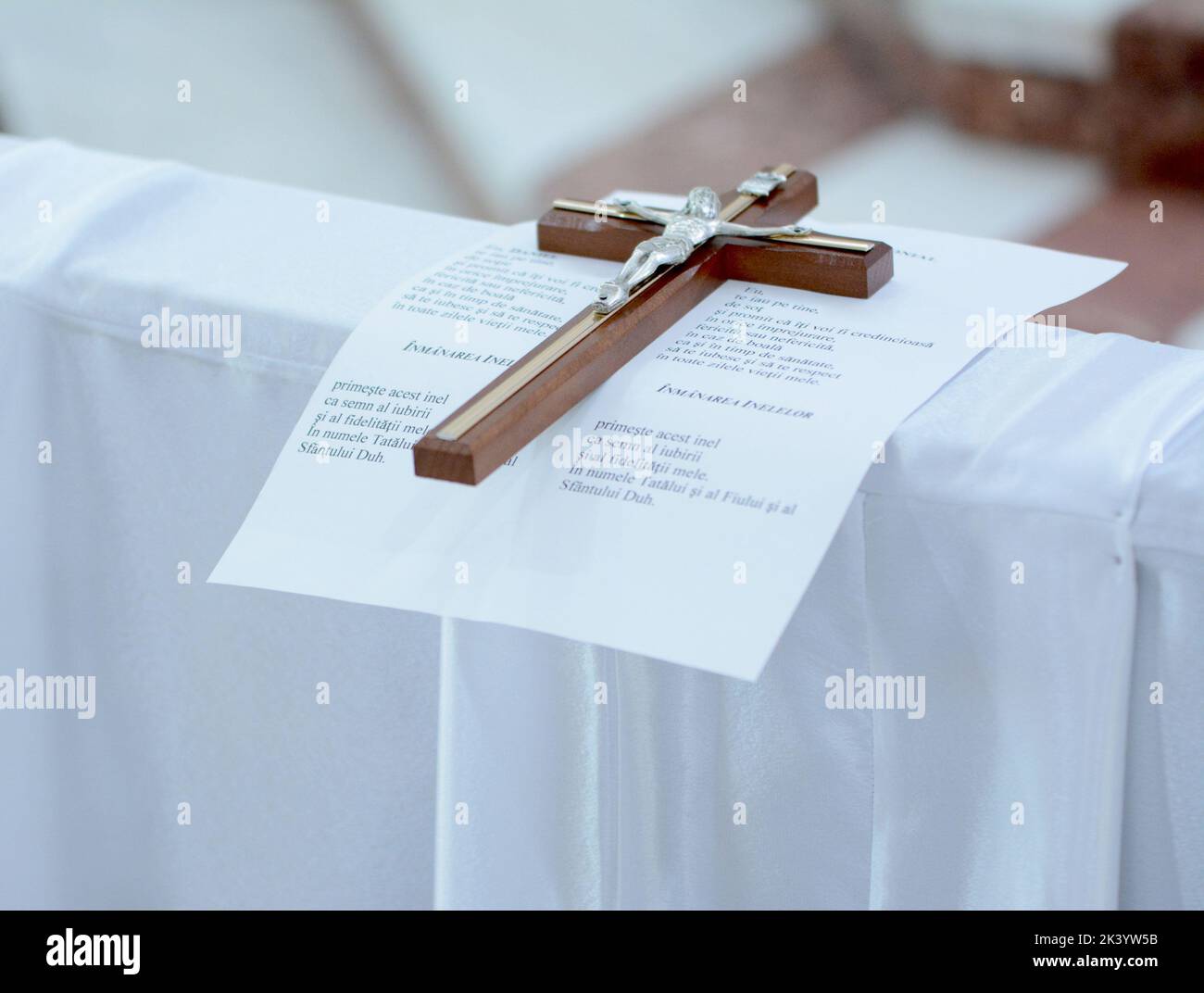A cross in the Catholic church and a vows under it Stock Photo Alamy