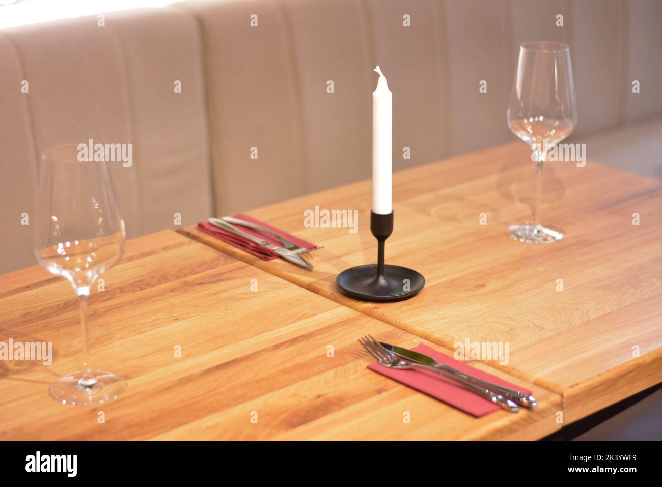 A candle on a restaurant table Stock Photo Alamy